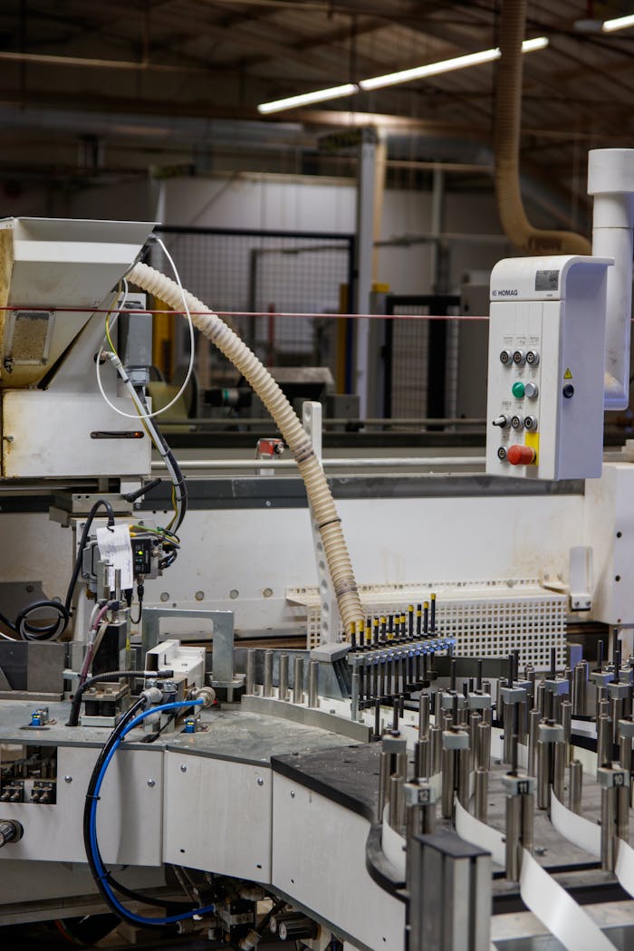 Services-02 Close-up of automated machinery in an industrial factory setting, perfect for industry and technology themes.