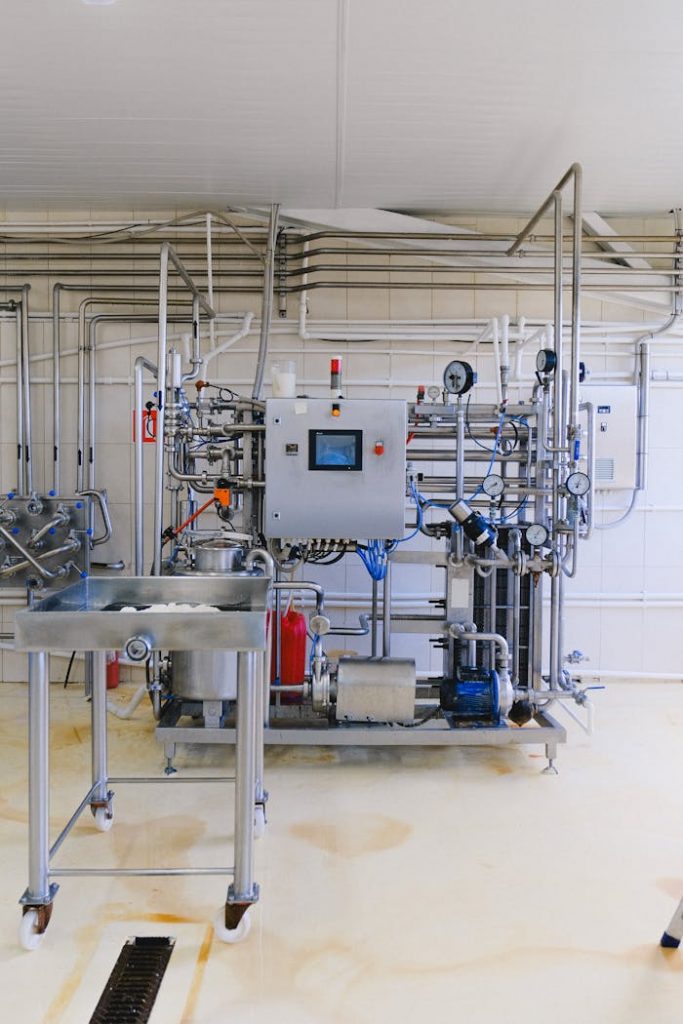 pexels photo 5953723 Detailed view of complex industrial machinery in a modern factory environment.